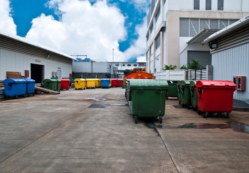 Professional team performing waste clearance for a construction project in Wallington
